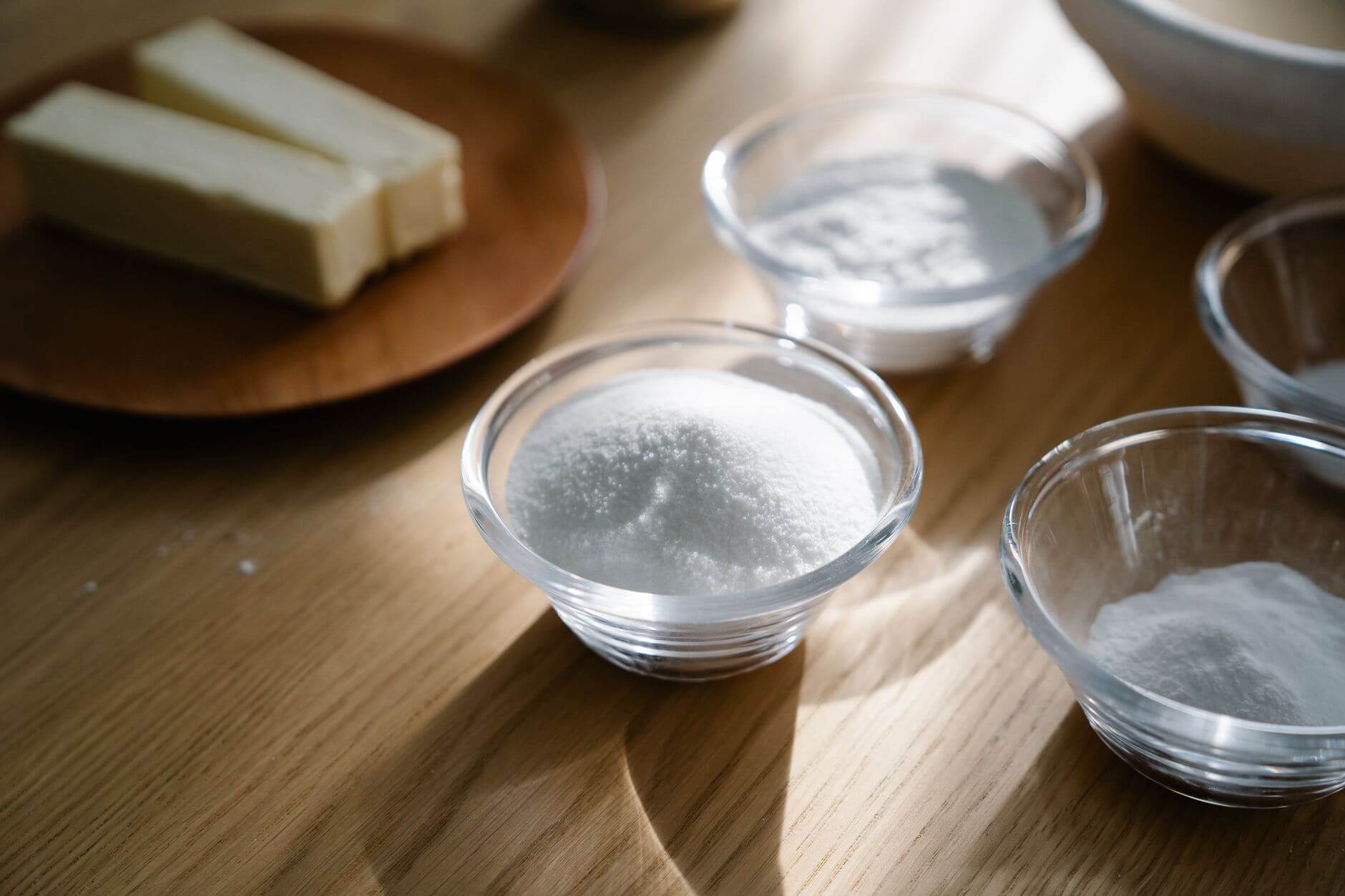close up shot of baking ingredients on wooden surface